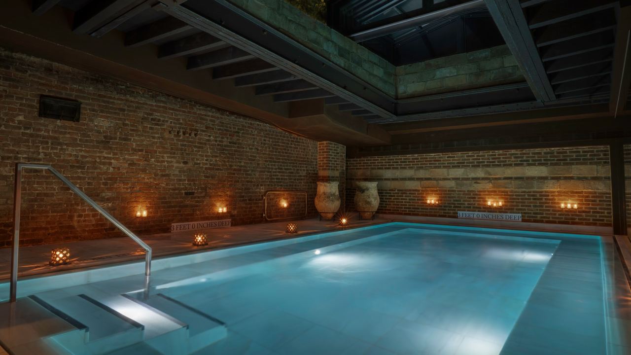 A thermal pool under the skylight at AIRE Ancient Baths, Tribeca